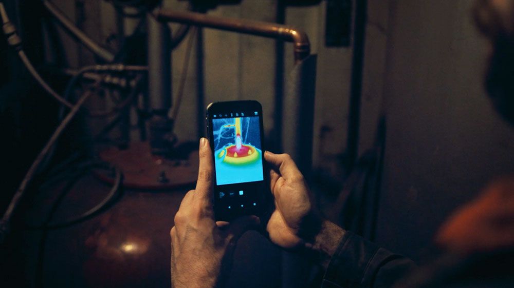 using FLIR camera in boiler room checking heat