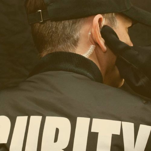 Security guard with earpiece