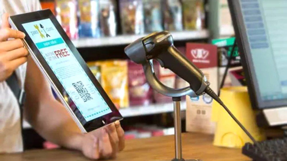 barcode scanner scans a barcode on a tablet