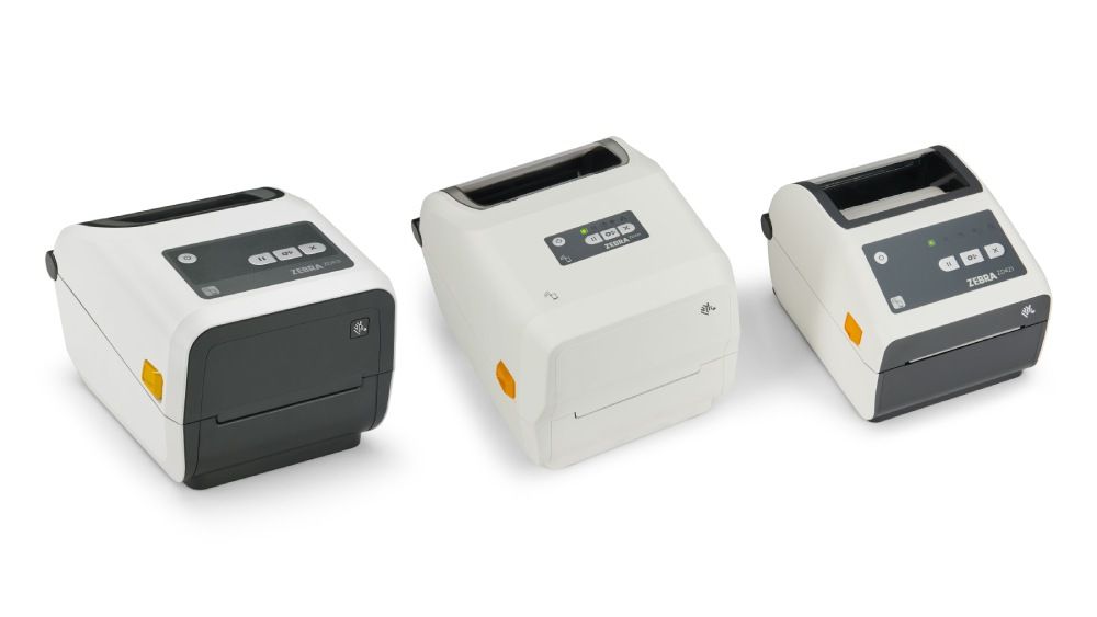 Three Zebra ZD40 healthcare printers in grey and white color